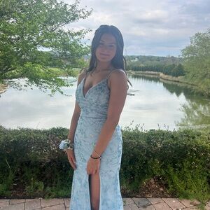 Beautiful light blue with floral prom dress with slit size 8